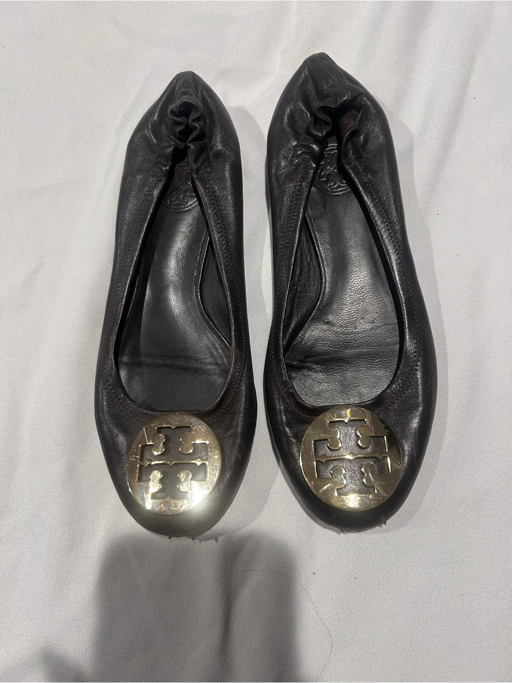 Tory Burch Black Leather Logo Ballet Flats with Gold Medallion